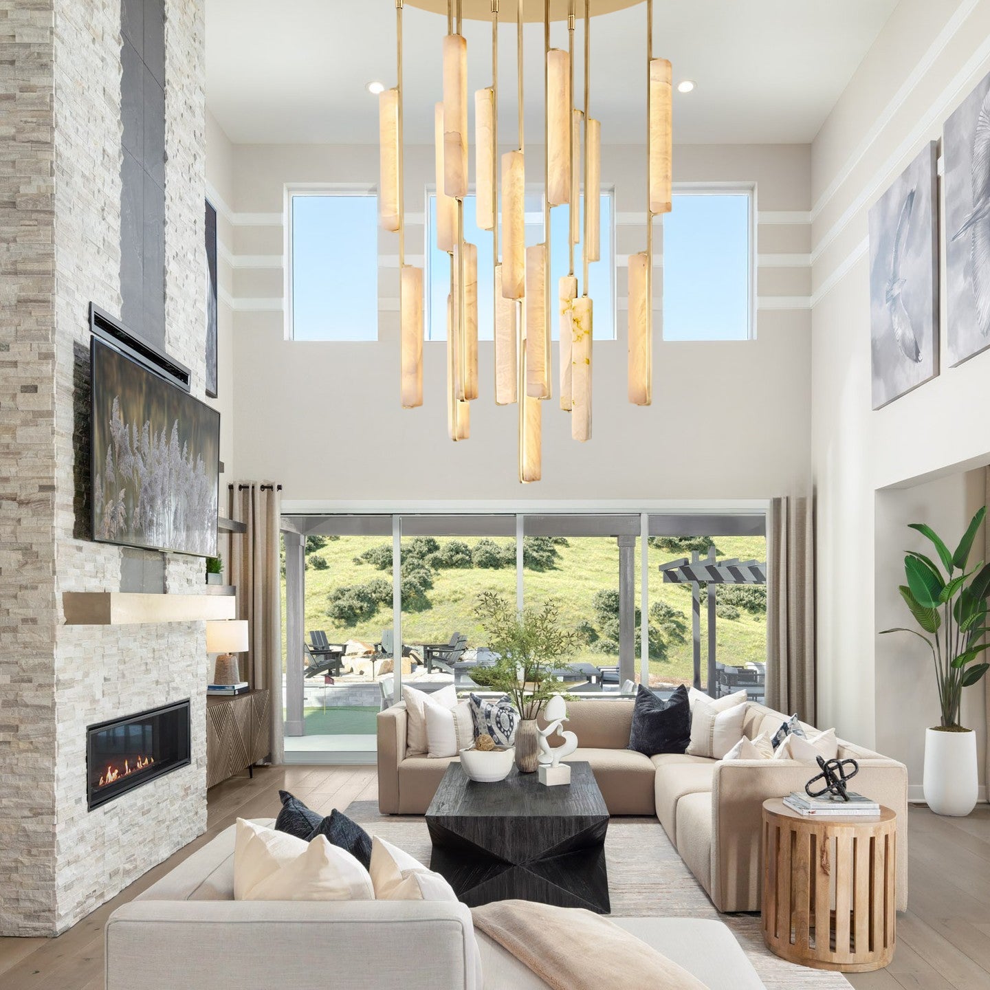 Modern living room with a fireplace, sectional sofa, and decorative elements.